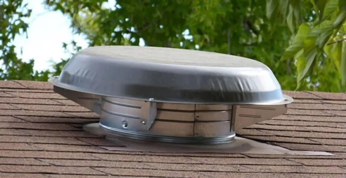 attic fan installation services with low-profile roof ventilation unit in Raleigh, NC