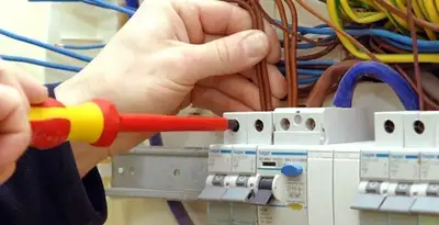 electrician services performing professional electrical panel wiring and connections in Raleigh, NC