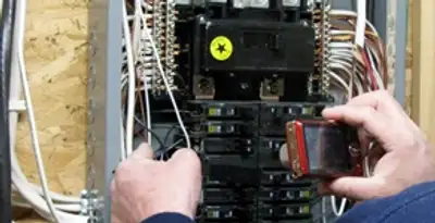 Home electrical inspection of circuit breaker panel by licensed electrician in Raleigh, NC
