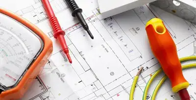licensed electrician planning and testing electrical systems using professional tools in Raleigh, NC