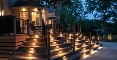 Residential electrician installing outdoor lighting for home safety in Raleigh, NC