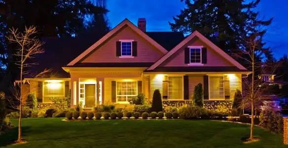 security light installation services illuminating a residential exterior at night in Raleigh, NC