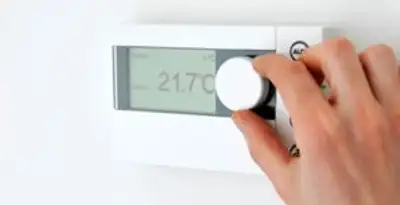 Thermostat installation service with professional adjusting temperature control in Raleigh, NC