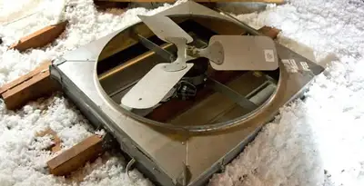whole house fan installation services with attic-mounted ventilation unit in Raleigh, NC